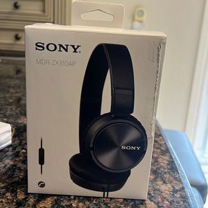 Sony never opened or used single wired headphones